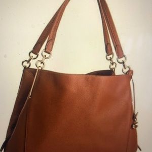 Coach saddle brown leather satchel.
